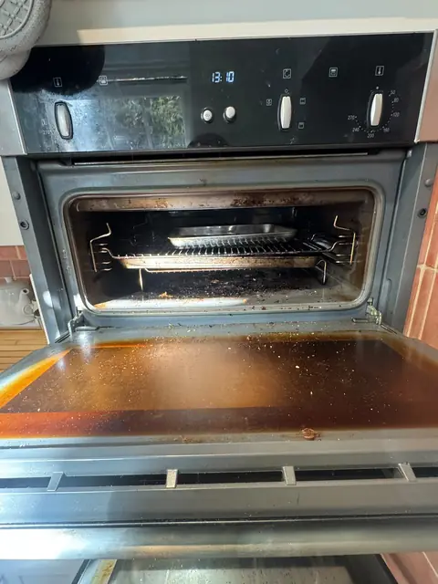 Built-under double oven before cleaning